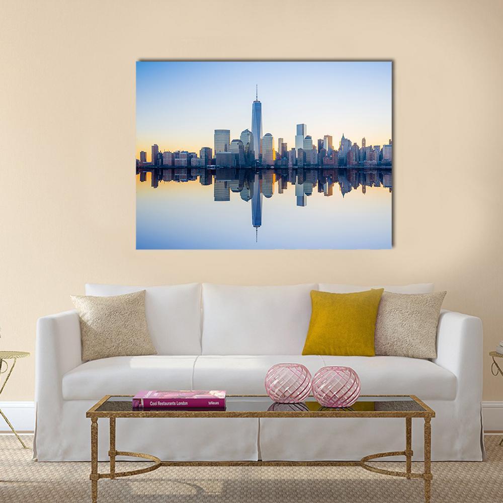 World Trade Center Reflection at Twilight Canvas Wall Art in orange, yellow and blue, single panel hung on a wall