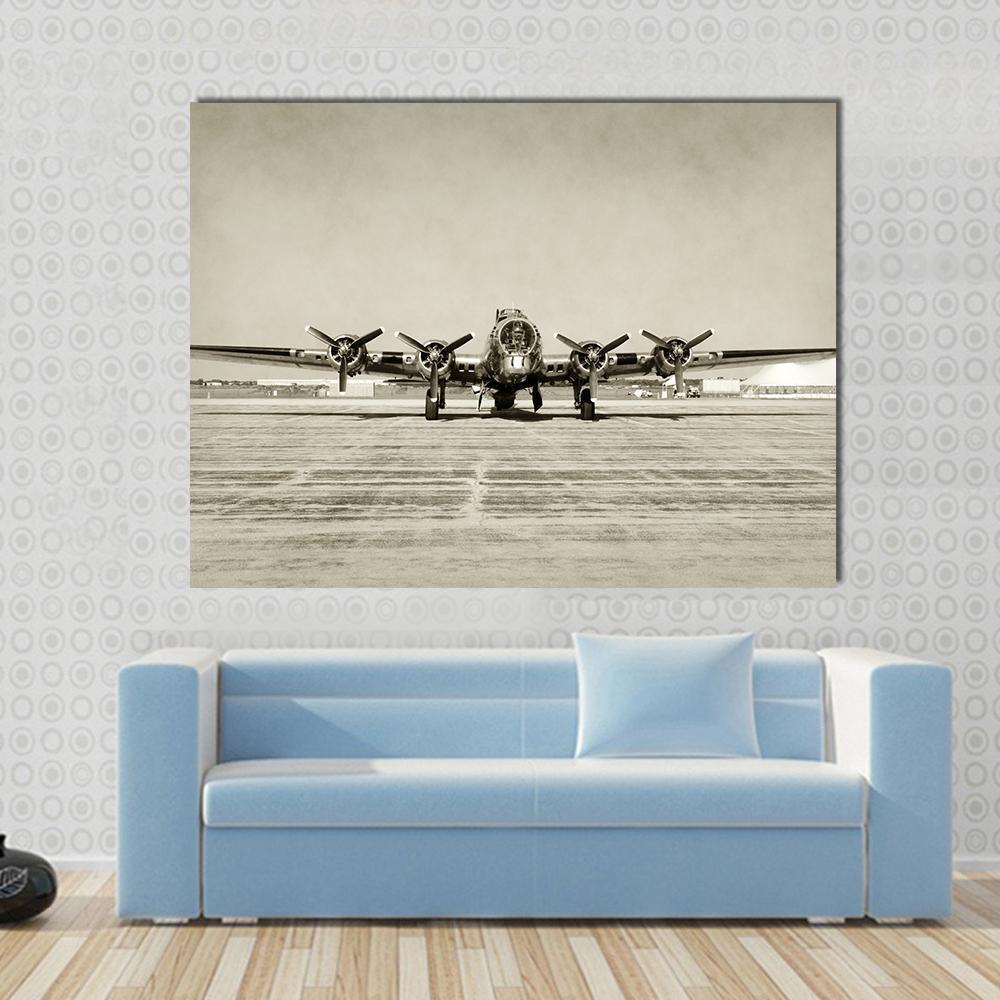 World War Ii Era Heavy Bomber Canvas Wall Art in black, gray and beige, single panel hung on a wall