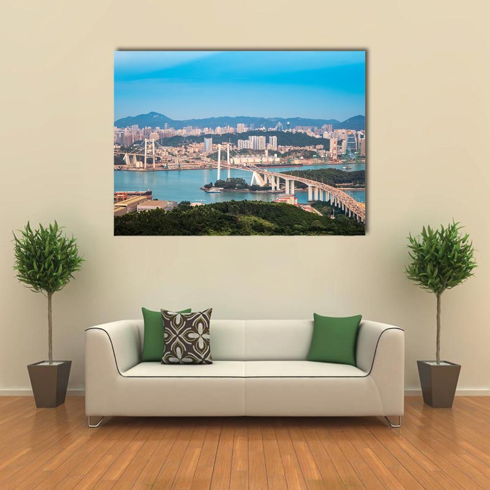 Xiamen Haicang Bridge at Dusk Canvas Wall Art in white, green and blue, single panel hung on a wall