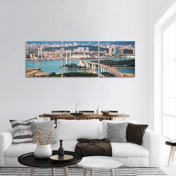 Xiamen Haicang Bridge at Dusk Panoramic Canvas Wall Art in white, gray and blue, hung on a wall