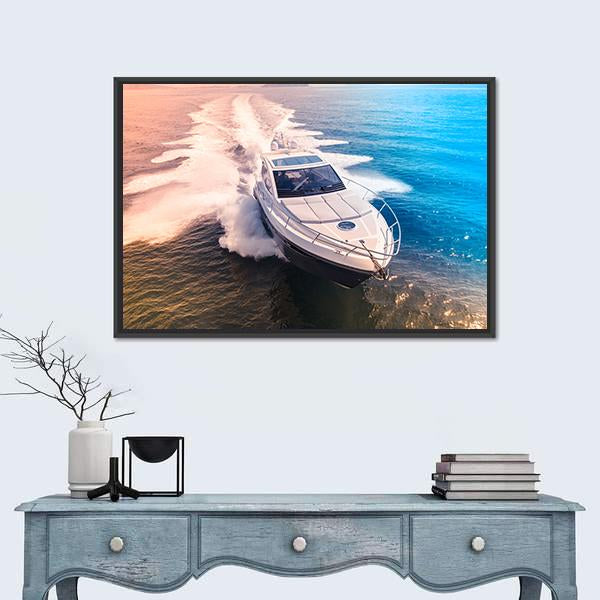 Yacht in Blue Water Canvas Wall Art in white, orange and blue, framed canvas, product view on a white background