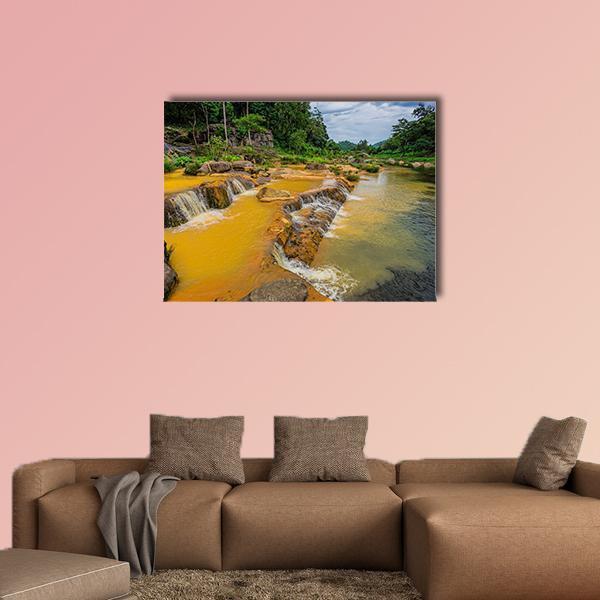 Yang Bay Waterfall in Vietnam Canvas Wall Art in brown, yellow and green, single panel hung on a wall