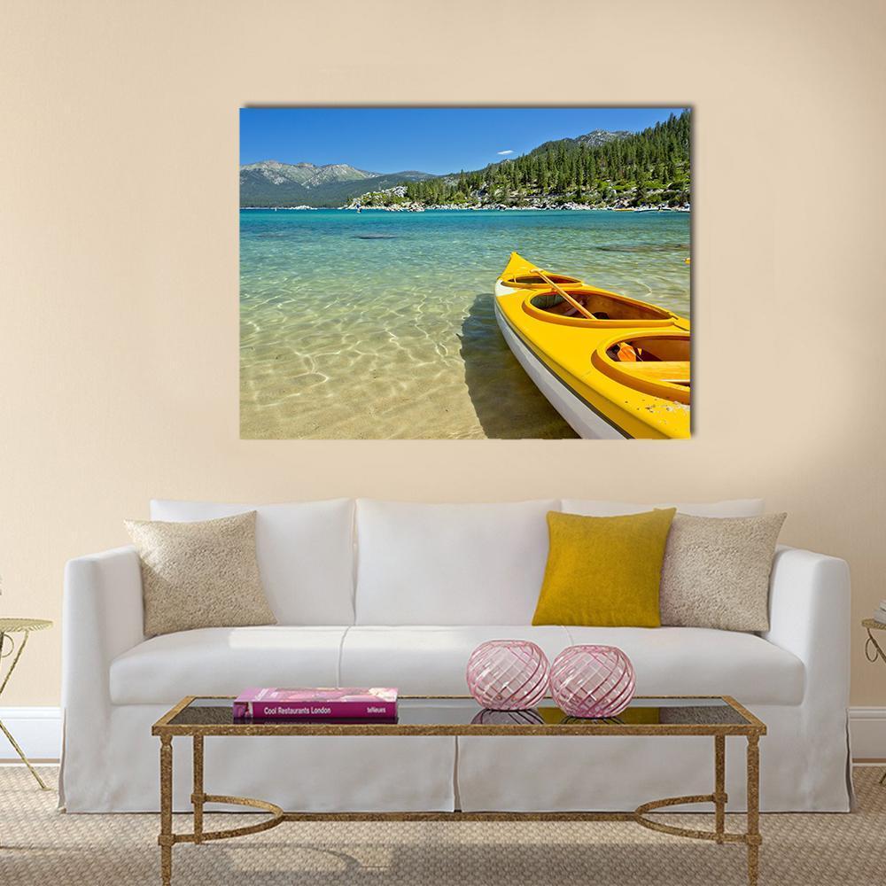 Yellow Kayak on Calm Lake Canvas Wall Art in yellow, green and blue, single panel hung on a wall