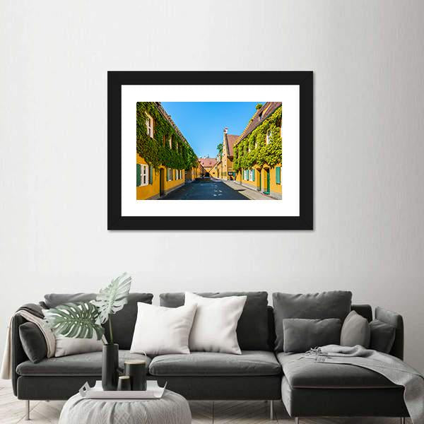 Yellow Walls In The Fuggerei Canvas Wall Art-3 Horizontal-Gallery Wrap-25" x 16"-Tiaracle