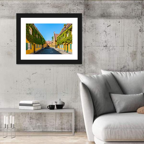 Yellow Walls In The Fuggerei Canvas Wall Art-3 Horizontal-Gallery Wrap-25" x 16"-Tiaracle