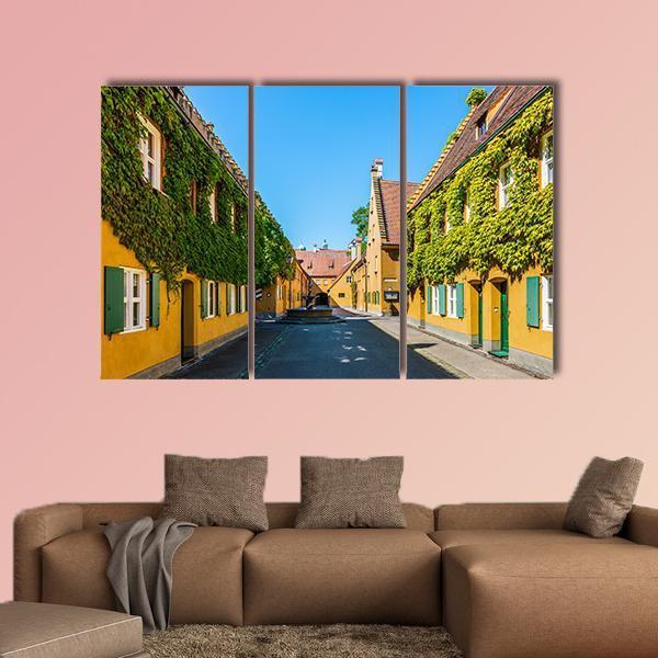 Yellow Walls In The Fuggerei Canvas Wall Art-3 Horizontal-Gallery Wrap-25" x 16"-Tiaracle
