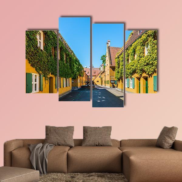 Yellow Walls In The Fuggerei Canvas Wall Art-4 Pop-Gallery Wrap-50" x 32"-Tiaracle