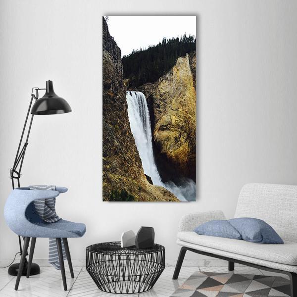 Yellowstone Grand Canyon Waterfall Vertical Canvas Wall Art in gray, brown and yellow, single vertical panel hung on a wall