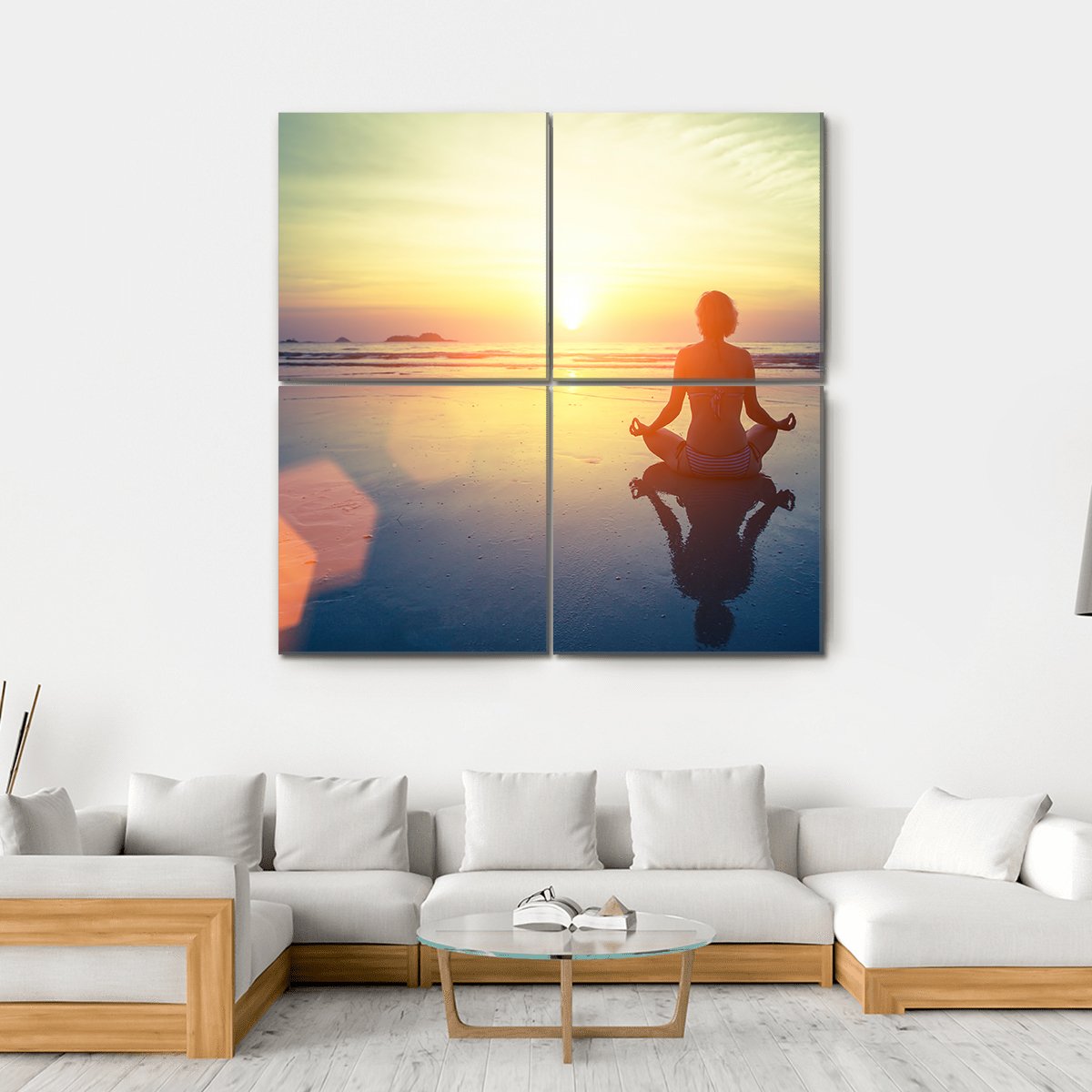 Yoga Woman at Sunset Canvas Wall Art in orange, yellow and blue, hung on a wall