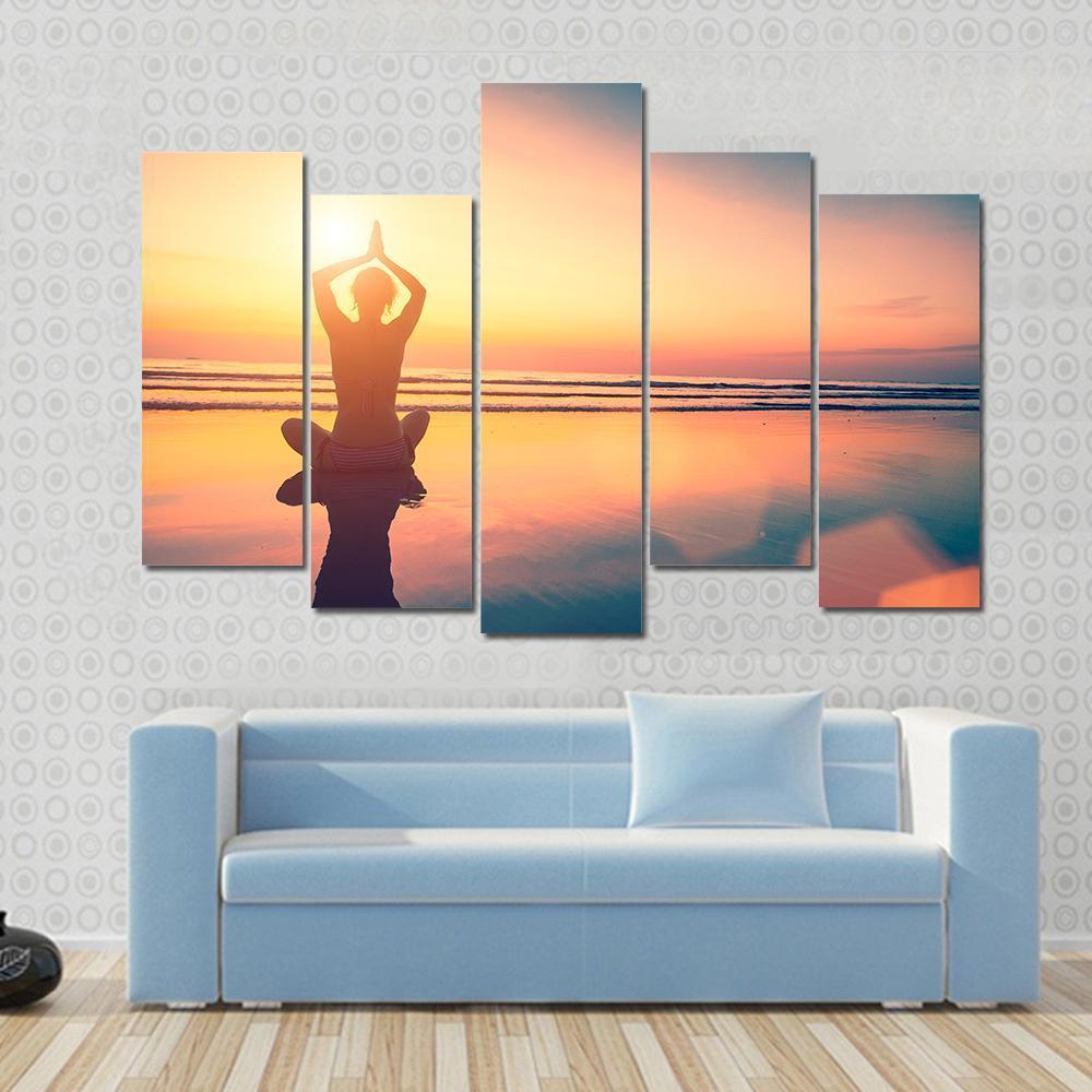 Yoga Woman Sitting In Lotus Pose On The Beach Canvas Wall Art - Tiaracle