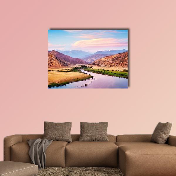 Yosemite Valley at Purple Sunset Canvas Wall Art in orange, blue and purple, single panel hung on a wall