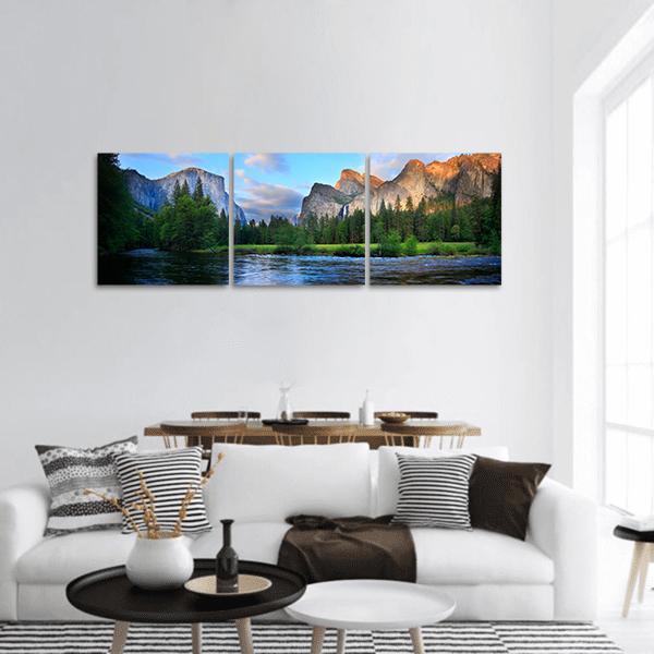 Yosemite Valley Merced River Sunset Panoramic Canvas Wall Art in orange, green and blue, hung on a wall