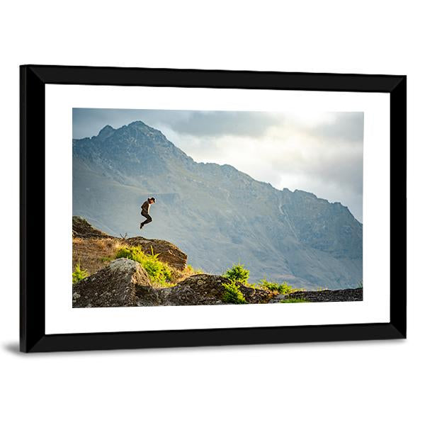 Young Man Jumping On Queenstown Hill Canvas Wall Art-3 Horizontal-Gallery Wrap-25&quot; x 16&quot;-Tiaracle