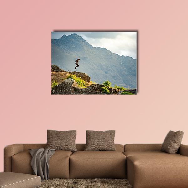 Young Man Jumping On Queenstown Hill Canvas Wall Art-1 Piece-Gallery Wrap-48" x 32"-Tiaracle