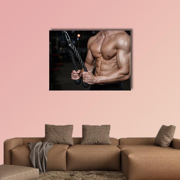 Bodybuilder Torso with Tricep Rope Canvas Wall Art in black, beige and brown, hung on a wall