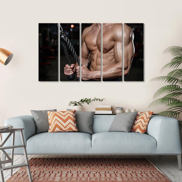 Bodybuilder Torso with Tricep Rope Canvas Wall Art in black, beige and brown, hung on a wall