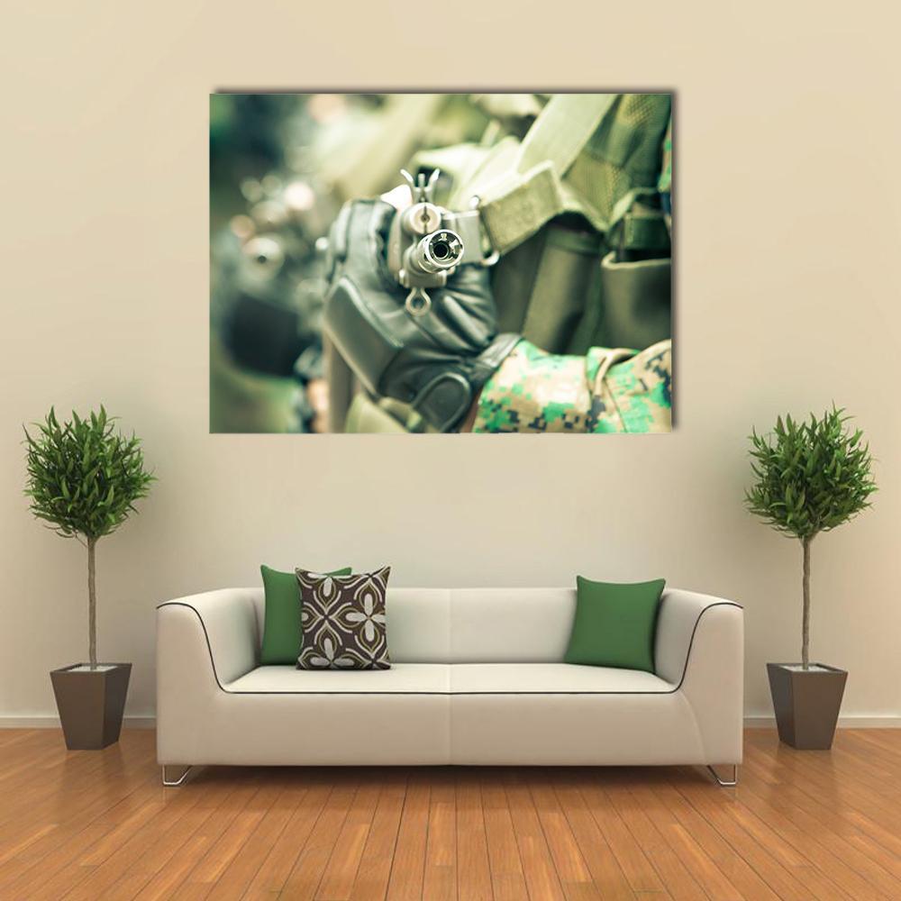 Young Soldiers with Guns Canvas Wall Art in black, gray and green, single panel hung on a wall