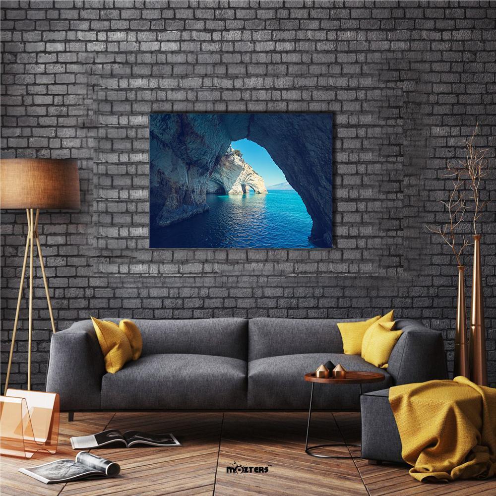 Zakynthos Rock Archway Over Blue Sea Canvas Wall Art in beige and blue, single panel hung on a wall
