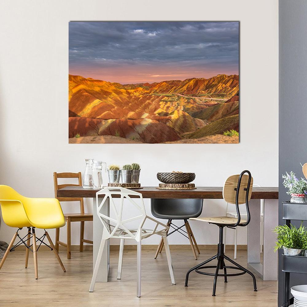 Zhangye Rainbow Mountains at Sunset Canvas Wall Art in orange, blue and multicolor, single panel hung on a wall