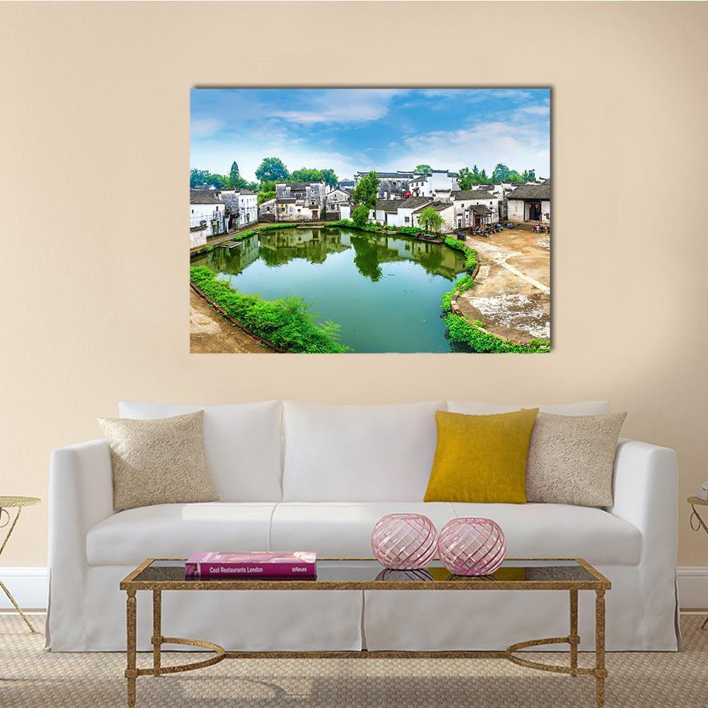 Zhuge Bagua Village Pond Reflection Canvas Wall Art in white, green and blue, single panel hung on a wall