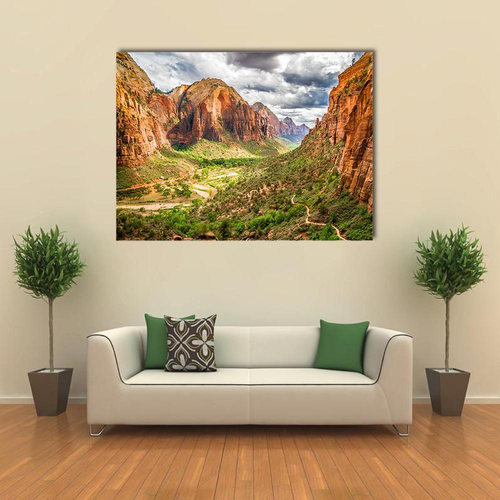 Zion National Park Mountain Valley with River Canvas Wall Art in brown, orange and green, single panel hung on a wall