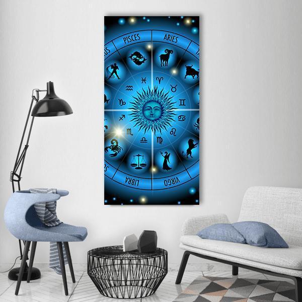 Zodiac Wheel with Sun Face Vertical Canvas Wall Art in black and blue, single vertical panel hung on a wall