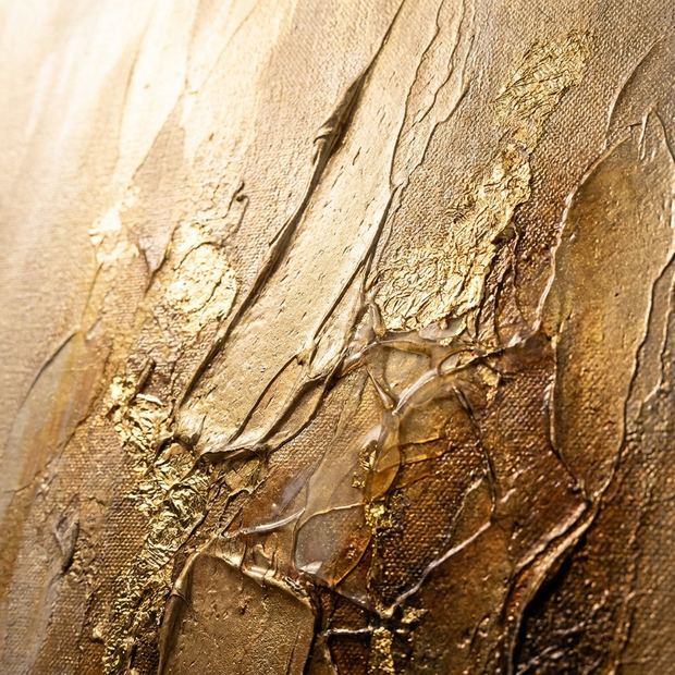 Gold canvas wall art, close up of the painted surface