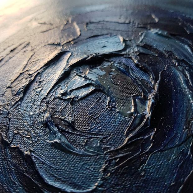 Navy canvas wall art, close up of the painted surface