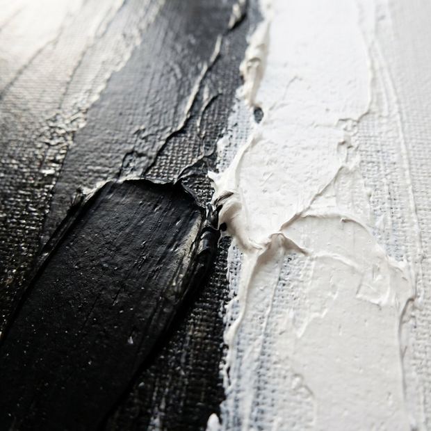 Black and White canvas artwork, two colors meeting on the painted surface